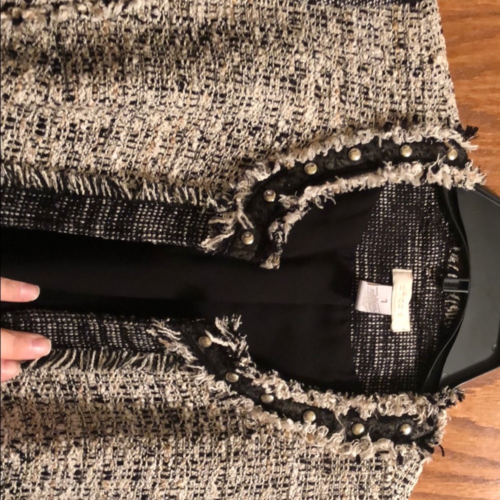 Chico’s  blazer. Great to dress up or down.
